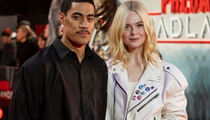 Elle Fanning e Dimitrius Schuster-Koloamatangi durante exibição especial de "Predador: Badlands" em Londres.